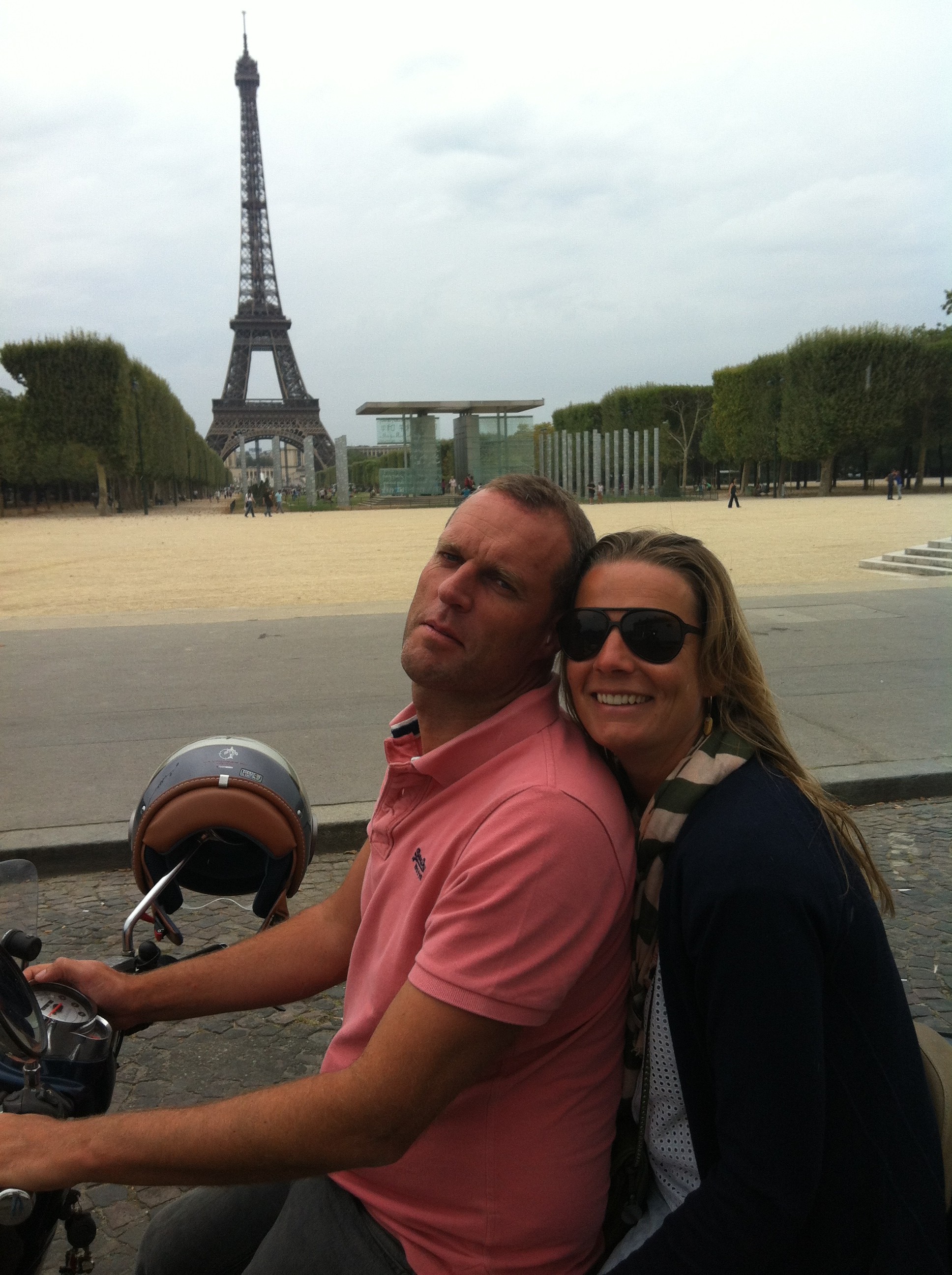 Mieke and Philip at Eiffel Tower and Champs de Mars by scooter.